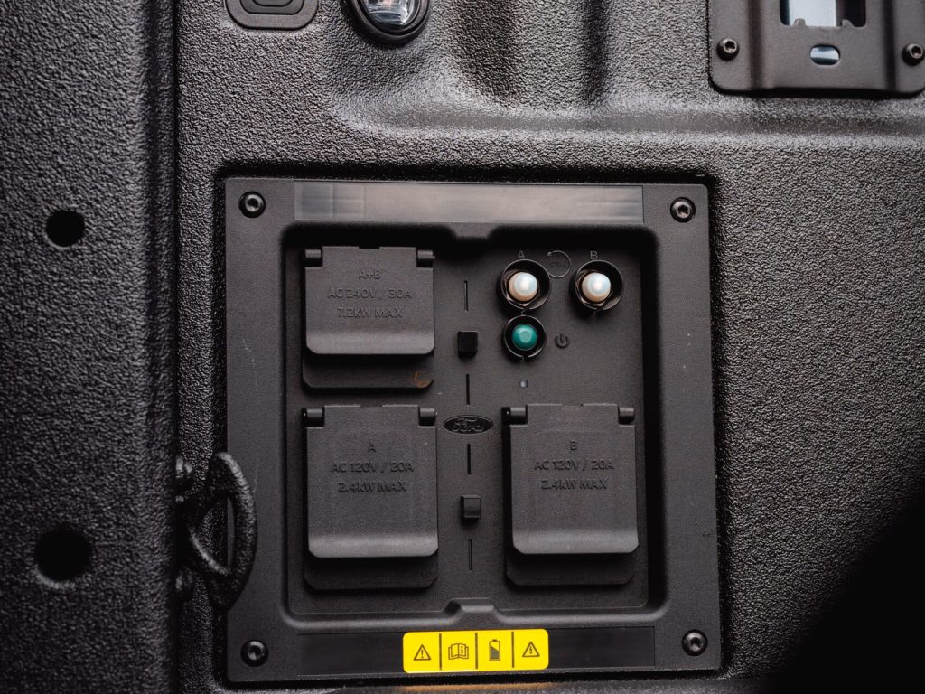 The Ford F-150 Platinum Hybrid Pro Power Onboard system, with a built-in generator and multiple outlets.